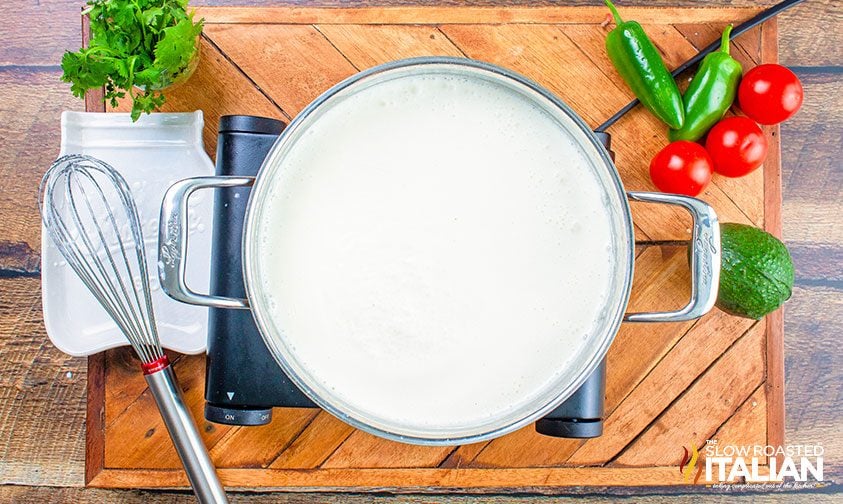 making cheese sauce for taco mac and cheese