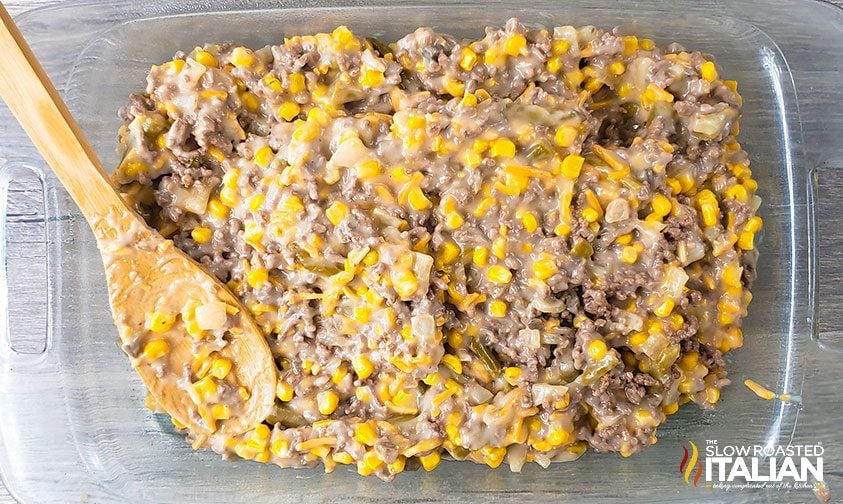 spreading ground beef and veggie mixture into glass baking dish