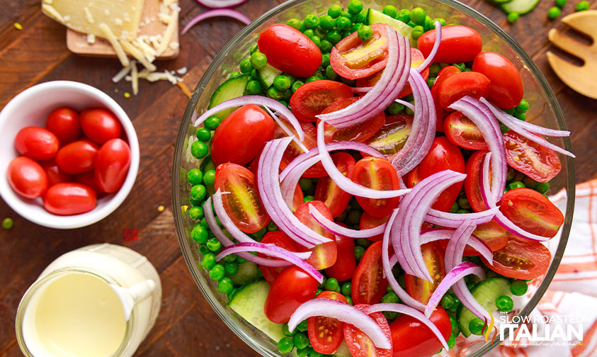 Adding onions to 7 layer salad