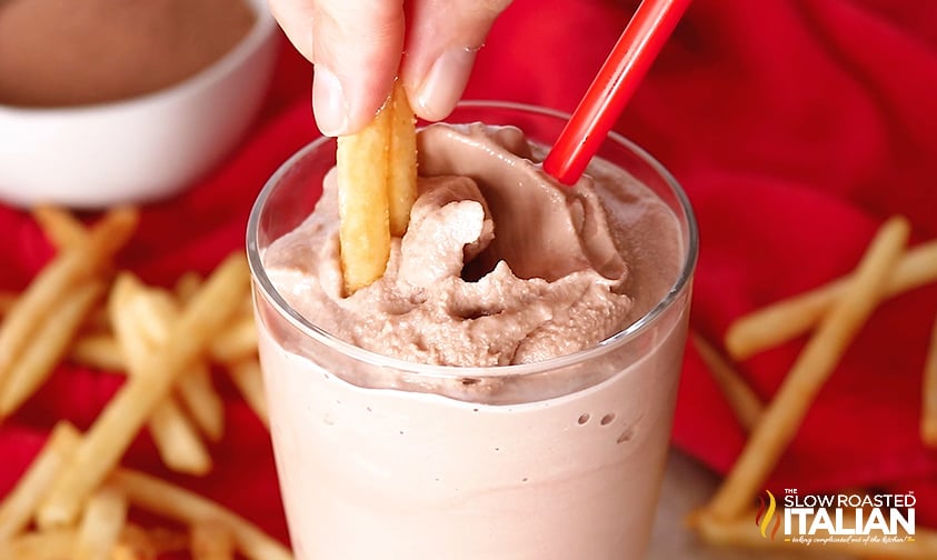 Wendy's chocolate frosty with fries being dipped in it