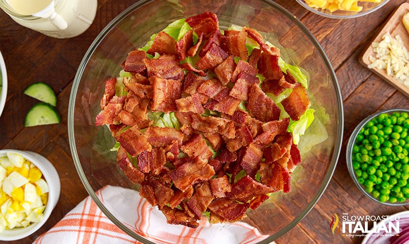 Adding bacon layer to 7 layer salad.