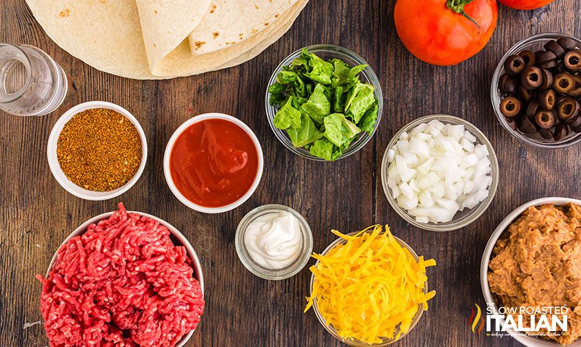 taco bell burrito fillings in bowls on counter.