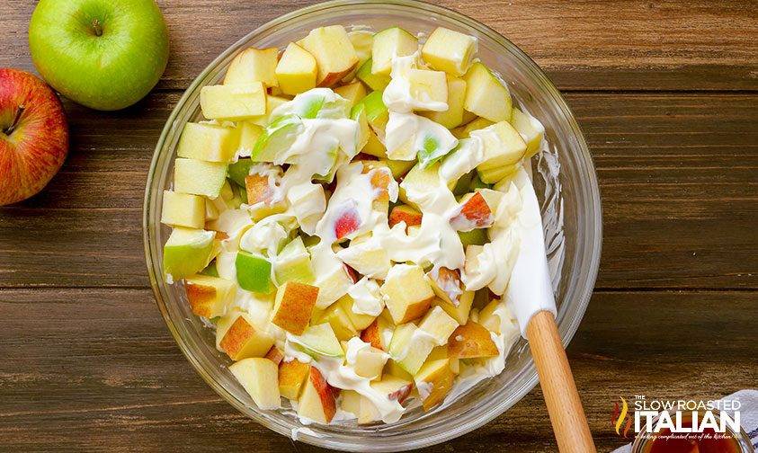folding cheesecake mixture into chopped apples