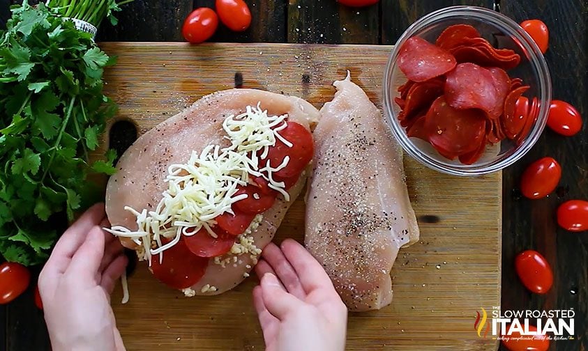 pepperoni and cheese in butterflied chicken