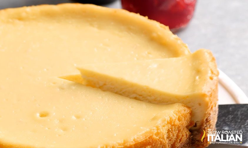 removing slice of crock pot cheesecake