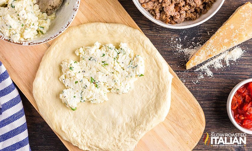 calzone filling on pizza dough