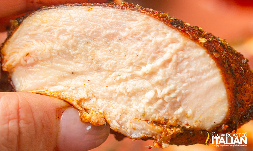 close up: showing slice of smoked chicken