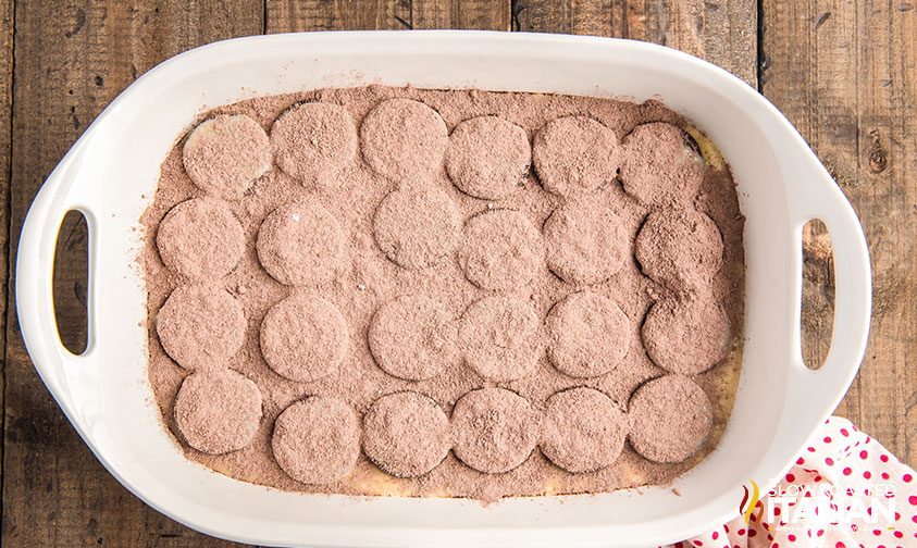 oreos covered with chocolate cake mix in baking dish