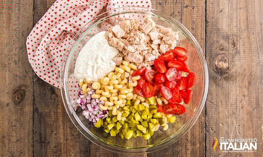 overhead: ingredients for pasta salad with tuna in a bowl