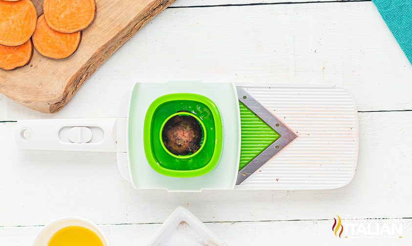 sweet potato in mandolin slicer