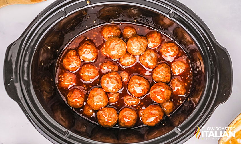 https://www.theslowroasteditalian.com/wp-content/uploads/2023/04/Crockpot-Honey-Garlic-Meatballs-3-WIDE.jpg