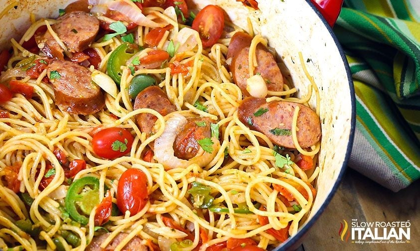 close up: pot of spaghetti with sausage and veggies