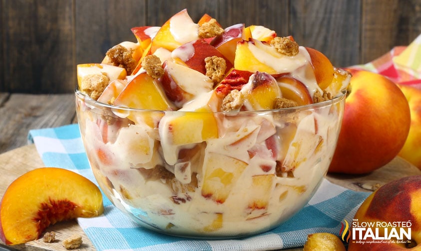 bowl of creamy peach cobbler cheesecake salad