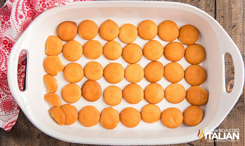 layer of nilla wafer cookies in bottom of a baking dish