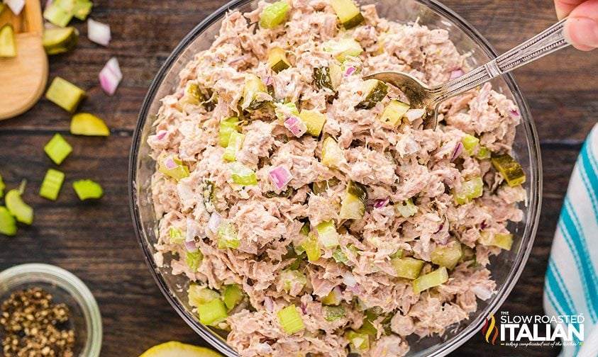 overhead: bowl of tuna salad with pickles
