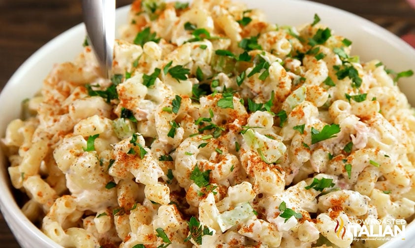 bowl of southern macaroni salad topped with fresh parsley