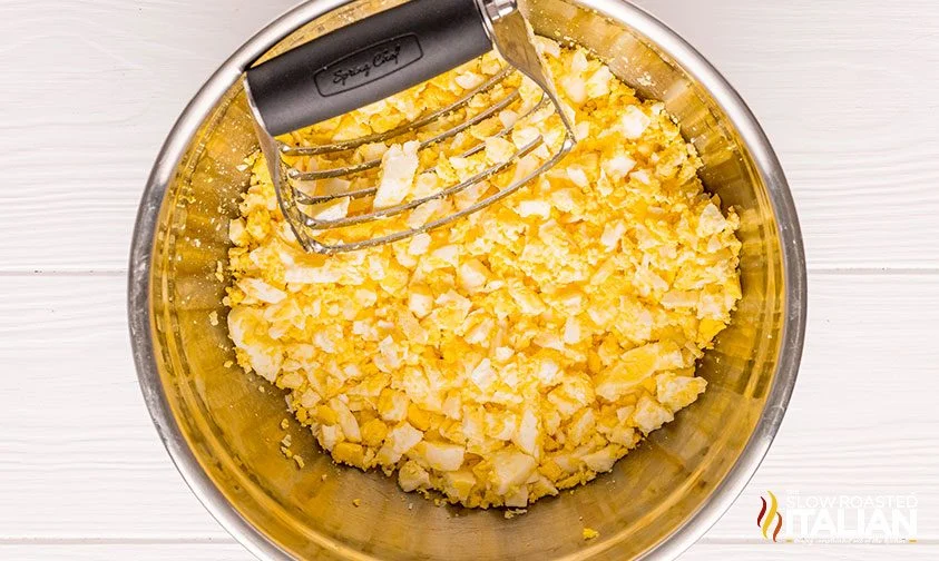 chopped hard boiled eggs with pastry cutter