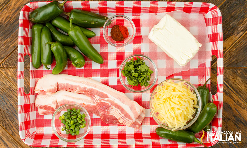 jalapeno popper ingredients on red and white checkered tray