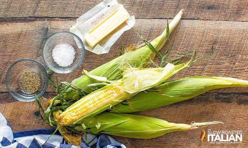 corn in husks with butter, salt, and pepper