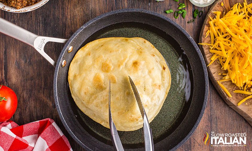 frying tortillas for mexican pizza