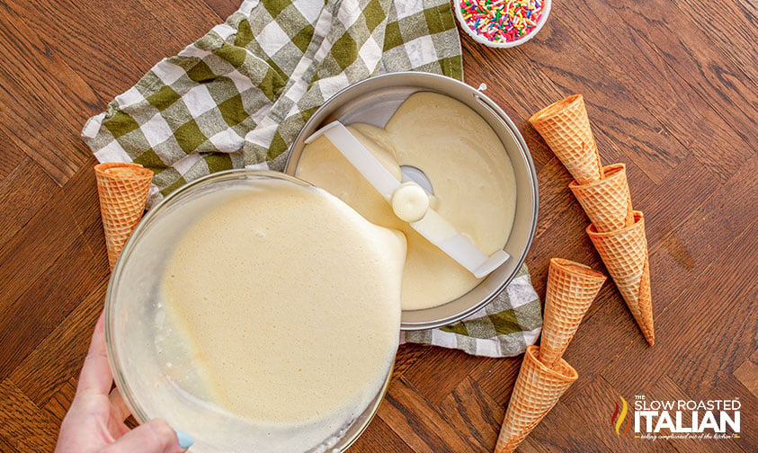 pouring ice cream mixture into machine