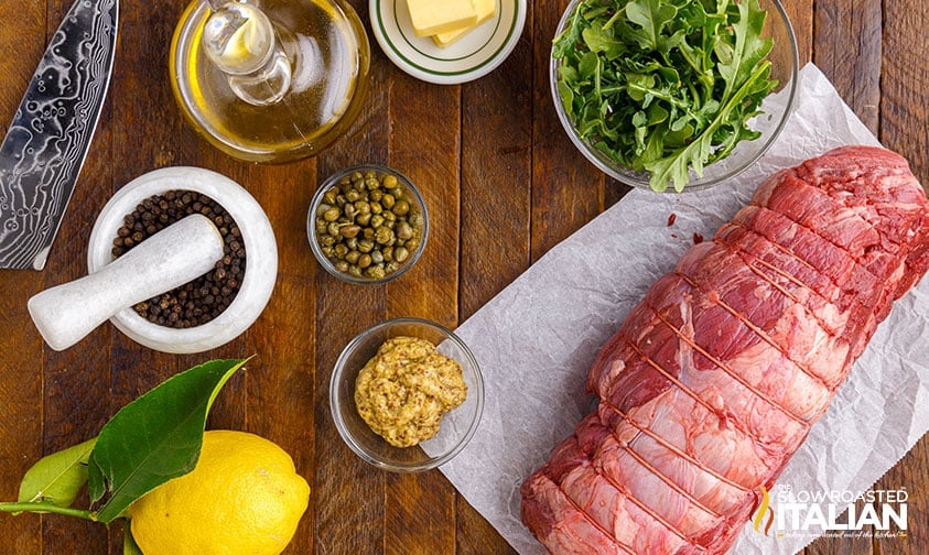 ingredients and tools to make beef carpaccio