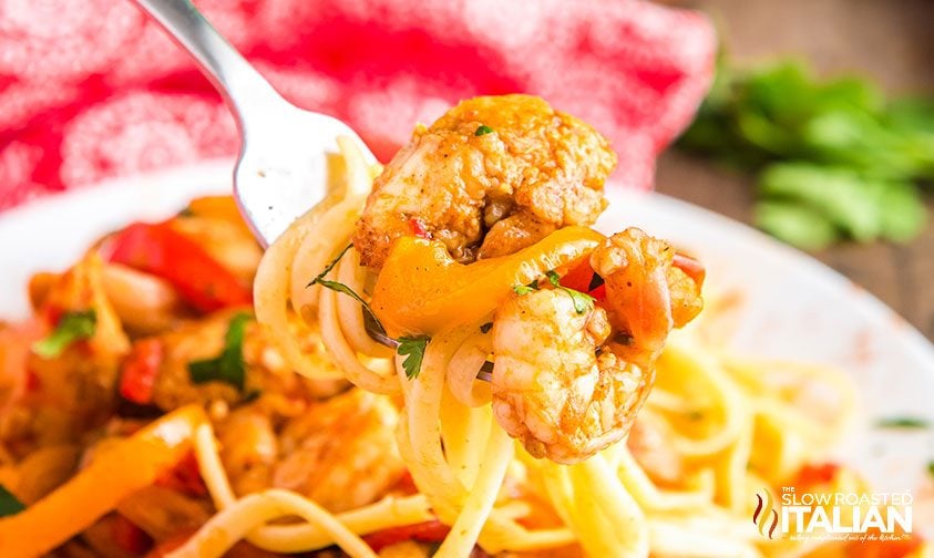 cajun jambalaya pasta twirled onto fork