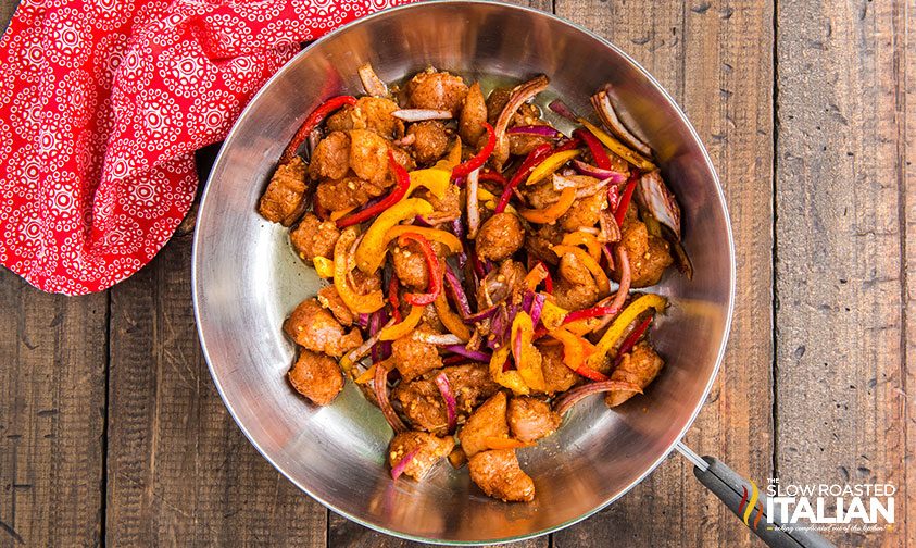 seasoned shrimp and peppers in skillet