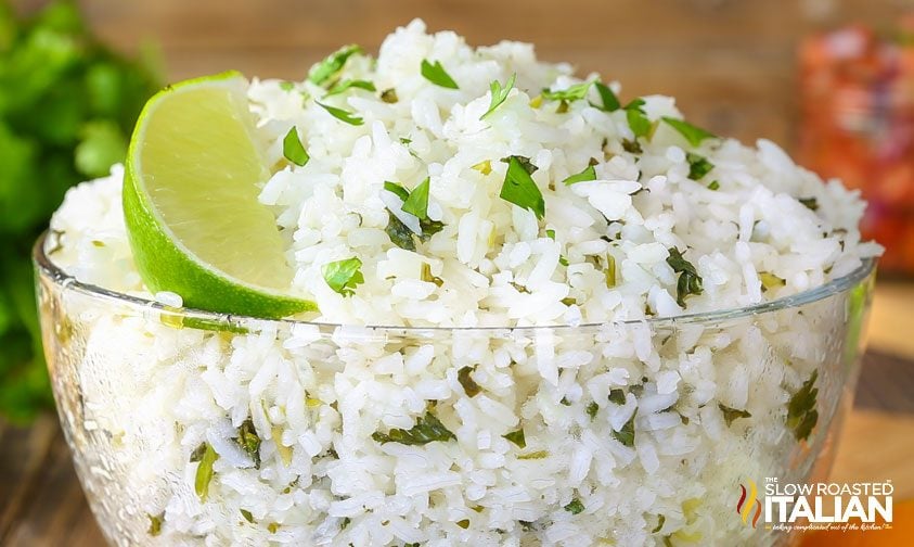 closeup: bowl of cilantro rice with lime