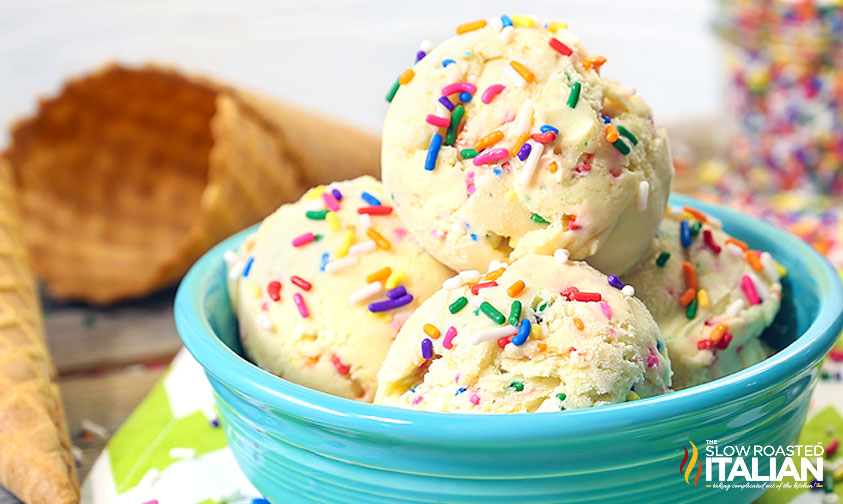 scoops of birthday cake ice cream in blue bowl