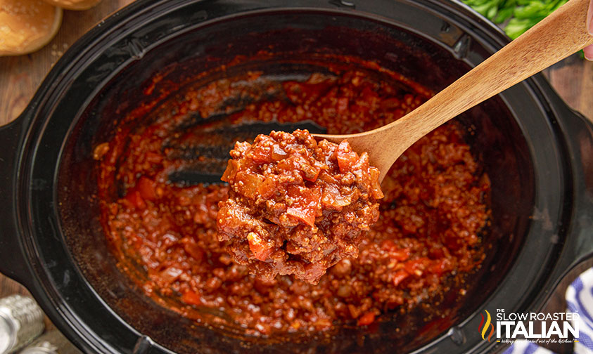 scooping sloppy joe mixture out of crockpot