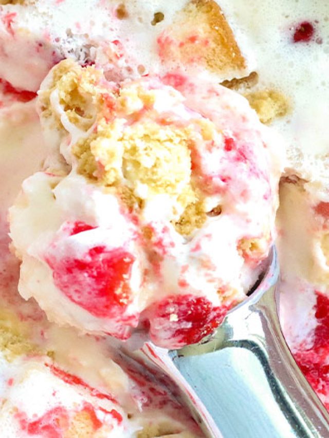 scooping strawberry shortcake ice cream from metal pan