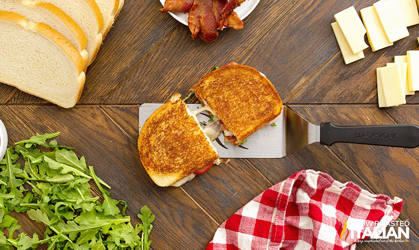 pulled apart fancy grilled cheese on spatula