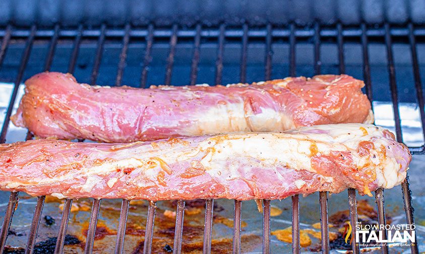 marinated pork tenderloins on smoker grates