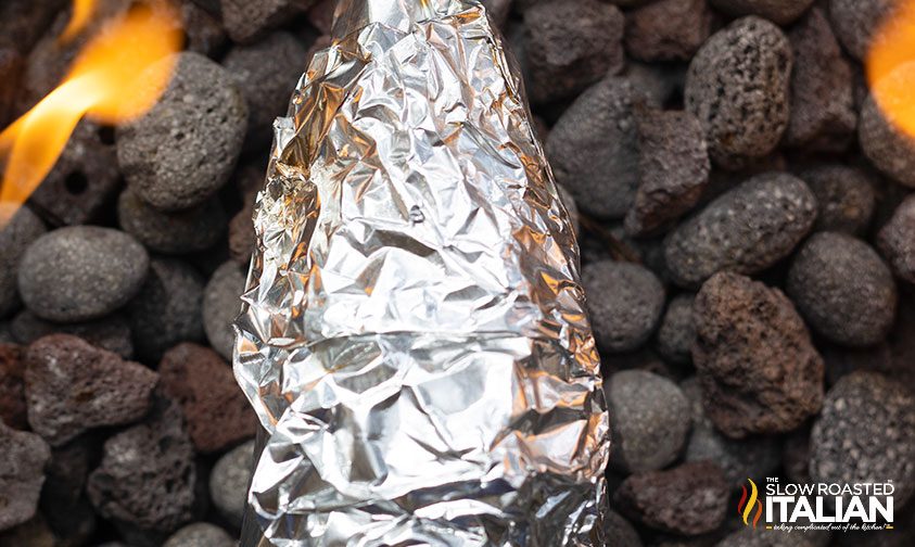 foil wrapped ice cream cone smores on hot coals