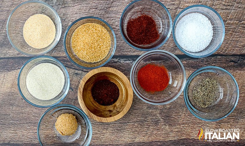 bowls of spices for chicken quarter dry rub