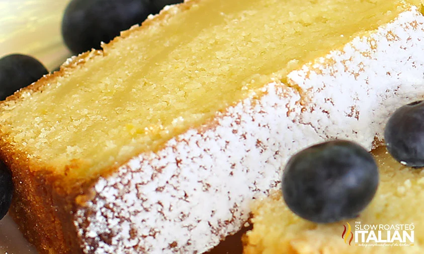 close up: slices of lemon pound cake topped with blueberries