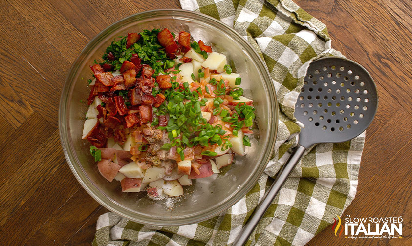 overhead: german potato salad ingredient in bowl