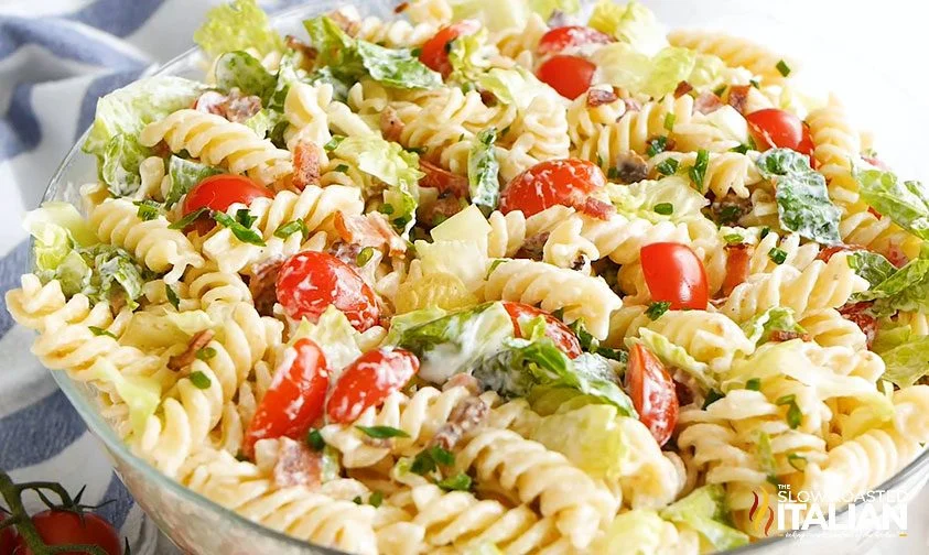 creamy pasta salad with lettuce, tomatoes, and bacon