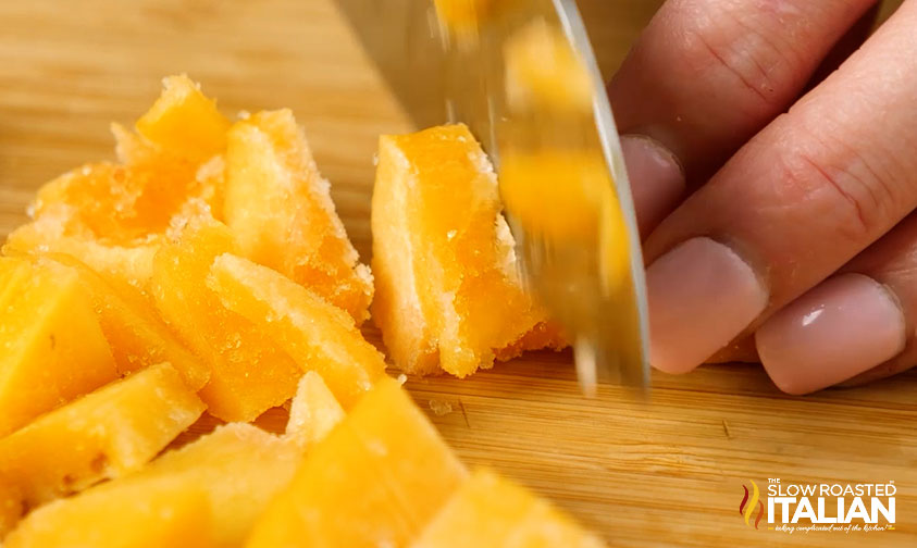 chopping frozen peaches