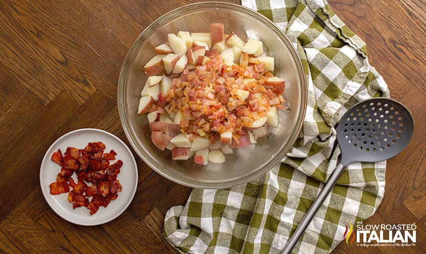 bowl of potatoes with vinegar onion dressing with bacon