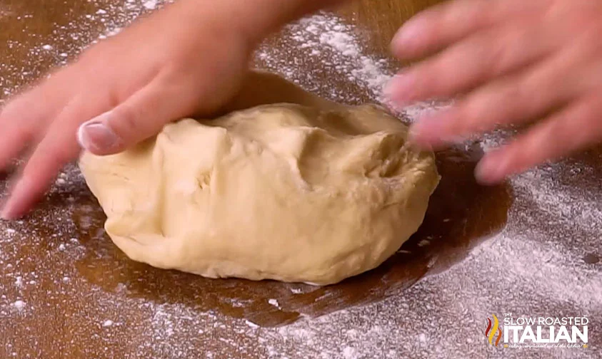 kneading dough for cinnamon rolls