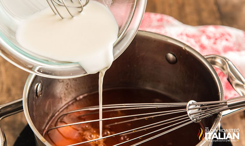 adding cornstarch slurry to sauce