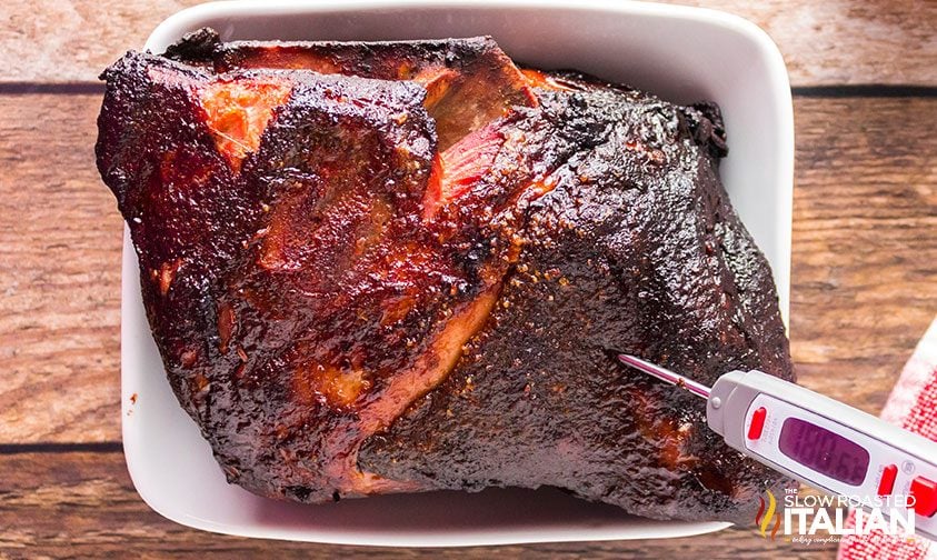 digital meat thermometer in pork butt reads 180.6 degrees Fahrenheit