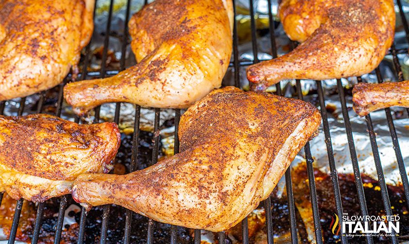 dry rubbed chicken leg quarters on smoker