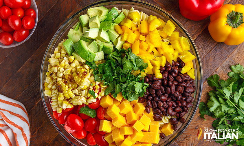 southwest pasta ingredients in large glass bowl