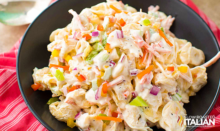 overhead: rainbow tortellini salad on plate