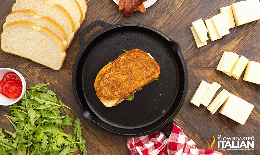 browned gourmet grilled cheese in cast iron skillet