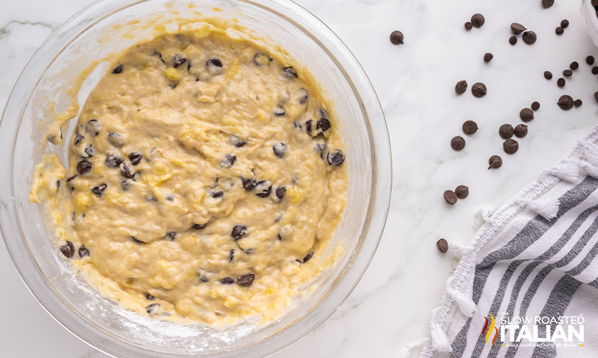 banana chocolate chip muffin batter in a mixing bowl