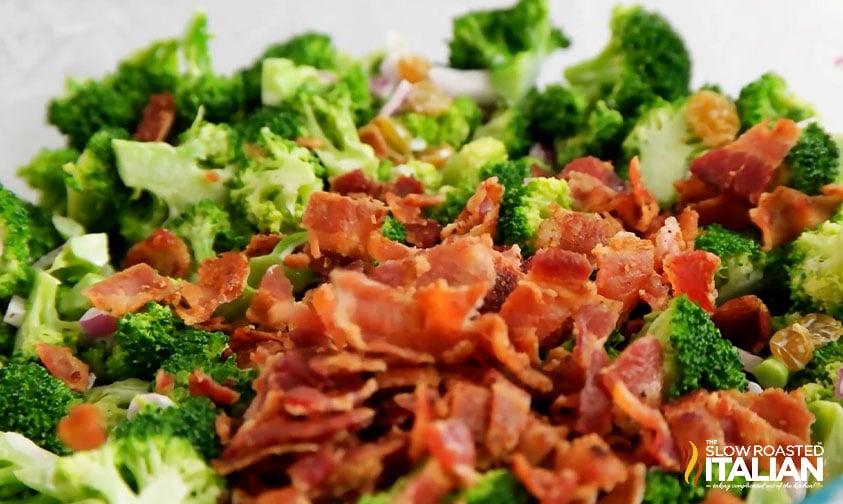 adding bacon to broccoli salad